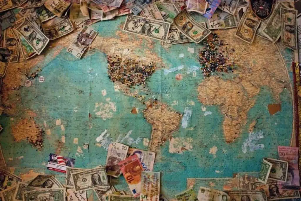 world map money currency landscape horizontal unsplash stock photo save money for travel