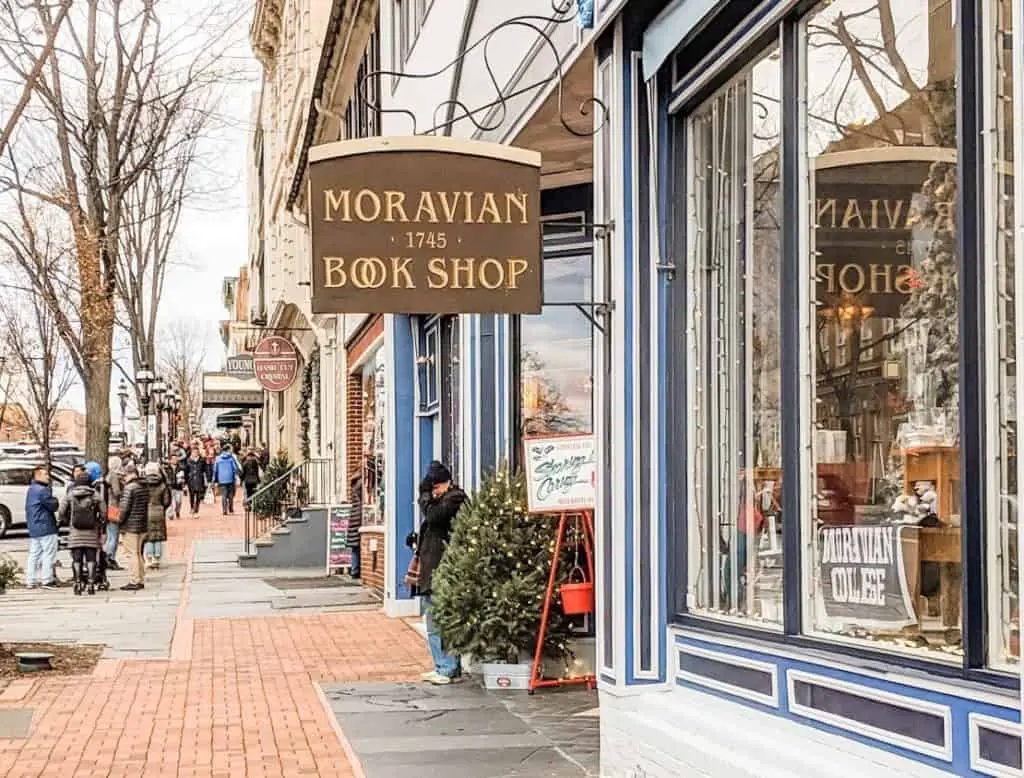 outside view of a small cute bookstore and sign