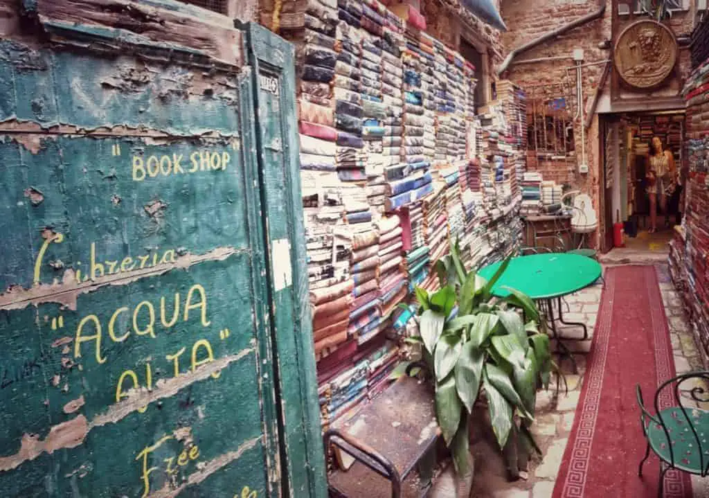 wall of books along a hallway