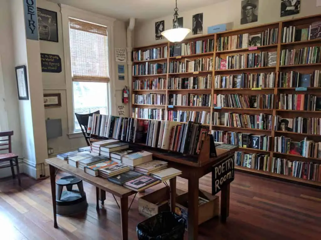 bookstore with table in the middle filled with books