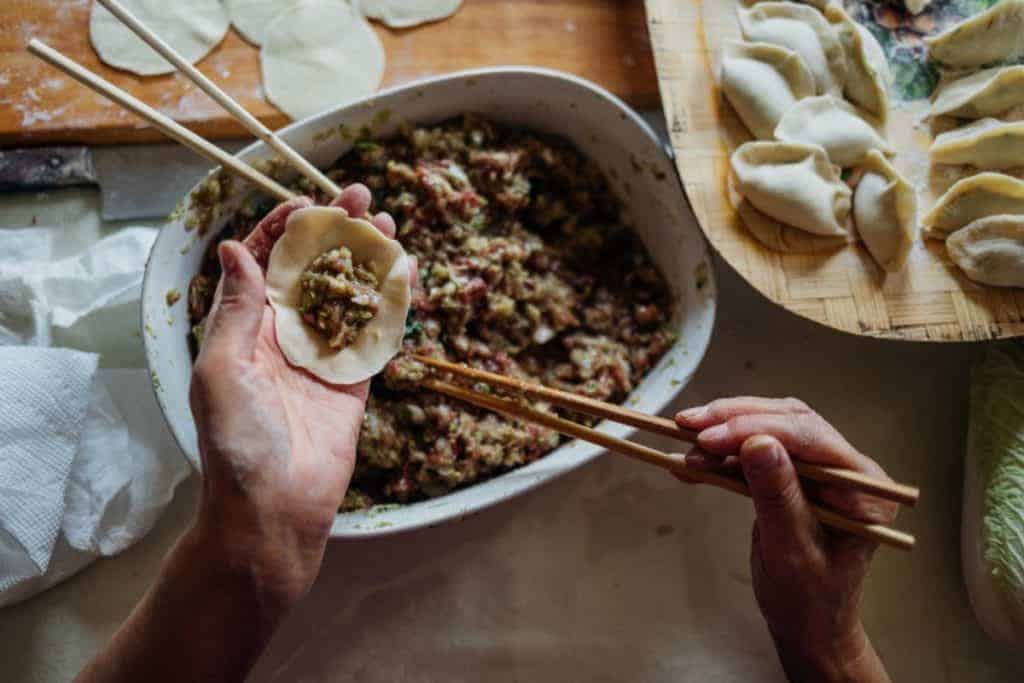 unsplash stock photo dumpling making class china shanghai itinerary 5 days