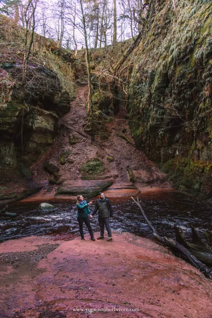 couple stands in devil's pulpit scotland